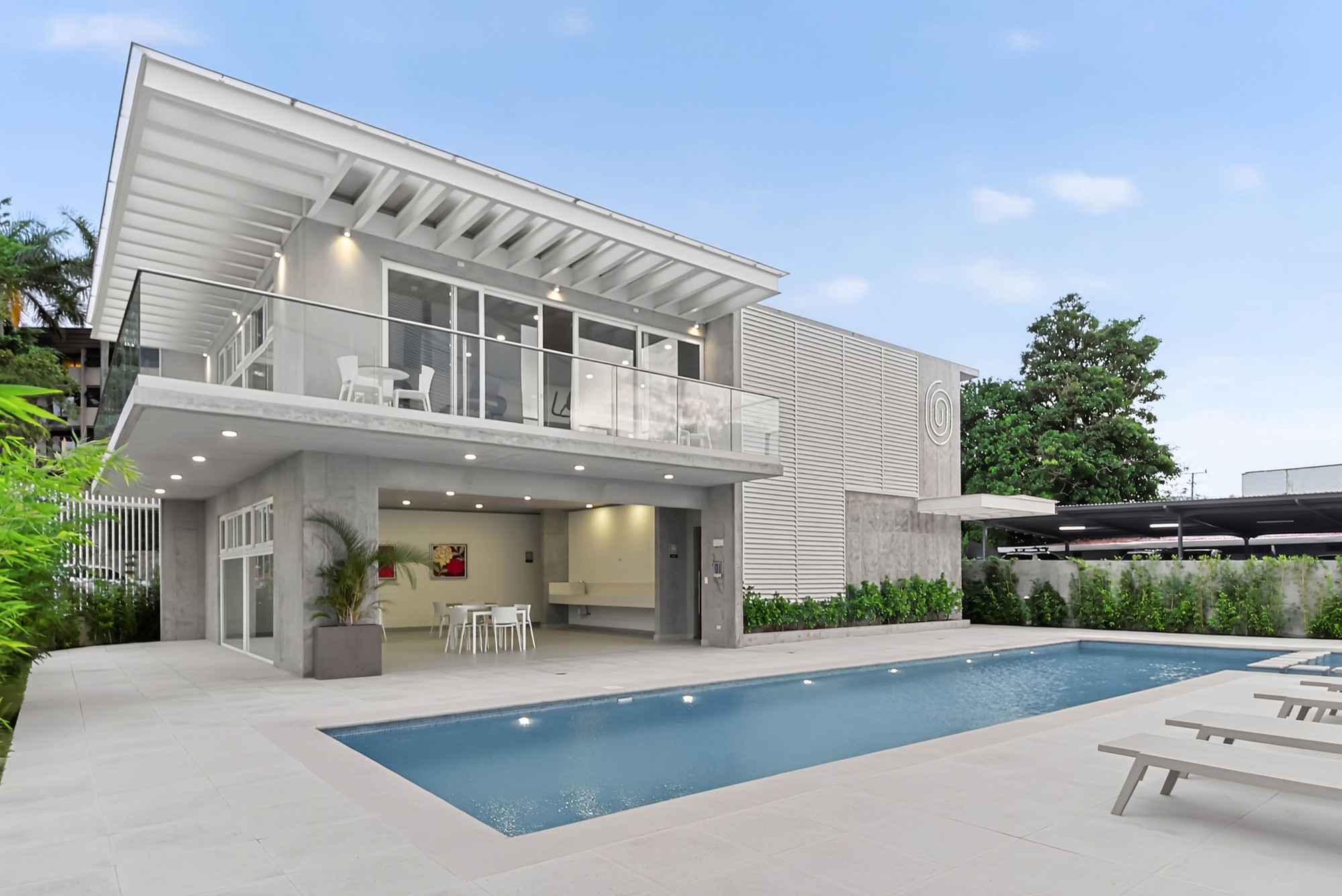 Pool and building exterior at Uruka Point